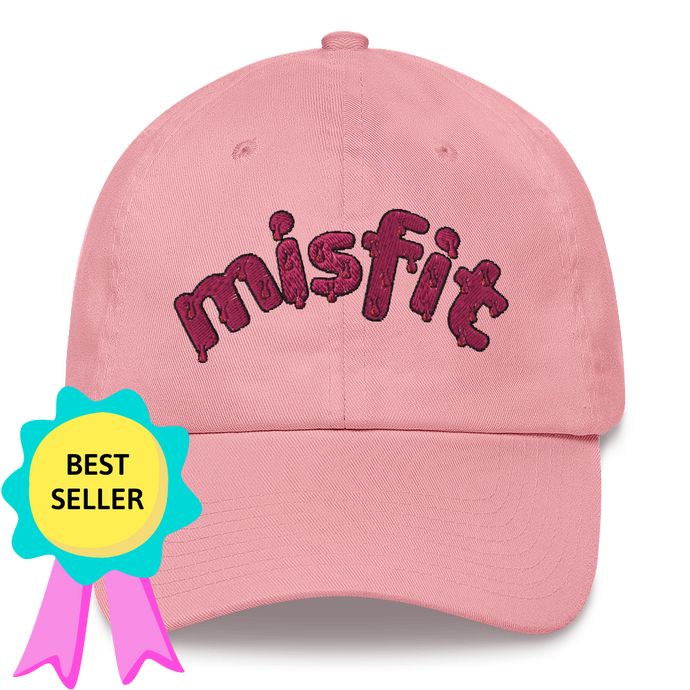Front view of the Misfit Dad Hat in pink, with a badge noting that it is a best selling item
